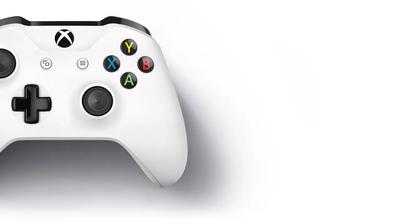 White Xbox One S wireless controller on a studio background